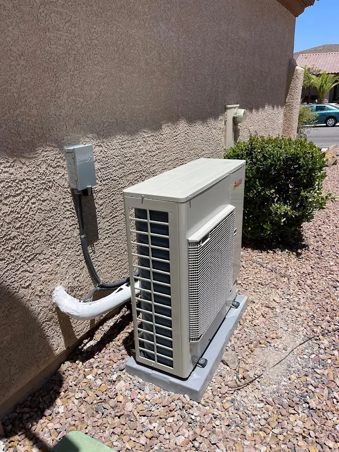 Residential air conditioning condenser unit in Harrisville